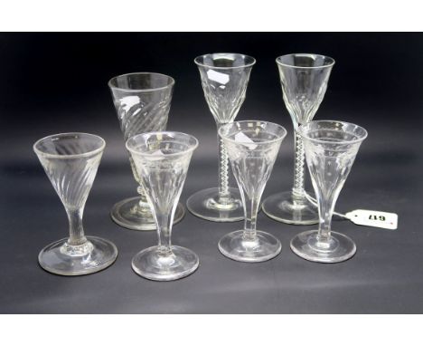 A Pair of Late XIX Century Wine Glasses, with part cut fluted bowls raised on white enamel twist stems and plain circular fee