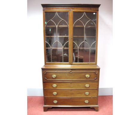 A Late XVIII Century Mahogany Secretaire Bookcase, the top with dentil cornice over glazed astragal doors, the base with secr