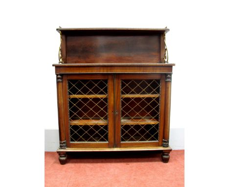 A XIX Century Regency Mahogany Chiffonier, with three-quarter gallery to upper shelf, 'S' shaped gilded brass supports, twin 