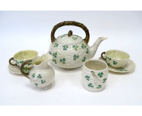 A Belleek Porcelain Part Bachelors Tea Service, in the Shamrock pattern against a moulded basketweave ground, comprising a gl