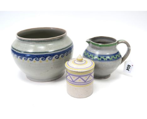 A Carter, Stabler and Adams Poole Pottery Red Earthenware Vase, of baluster form, painted with a geometric design of yellow d