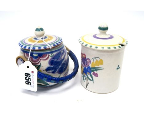 A Carter, Stabler and Adams Poole Pottery Red Earthenware Jam Pot and Cover, painted in the 'Blue Bird' pattern, amongst flow