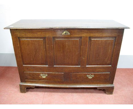 An XVIII Century Oak Mule Chest, the top with moulded edge over three panel front over two small drawers, on bracket feet, 81