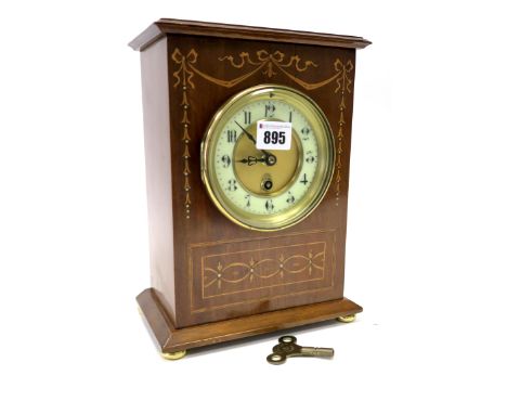 An Edwardian Mahogany and Satinwood Inlaid Mantel Clock, of rectangular form, the circular brass and enamel dial with Arabic 