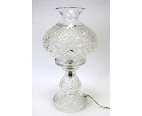 A Waterford Crystal Table Lamp, with hobnail decoration, the bulbous shaped shade with flared neck and raised on a knopped st