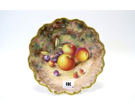 A Royal Worcester Porcelain Plate, of shaped circular form, painted by H. Ayrton, signed, with ripening fruit against a mossy