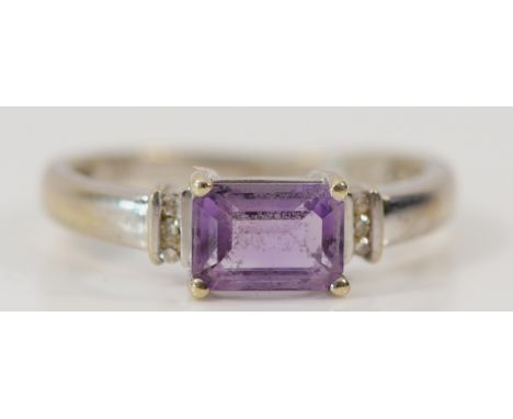 A 9ct white gold amethyst and diamond dress ring, M, 1.8g