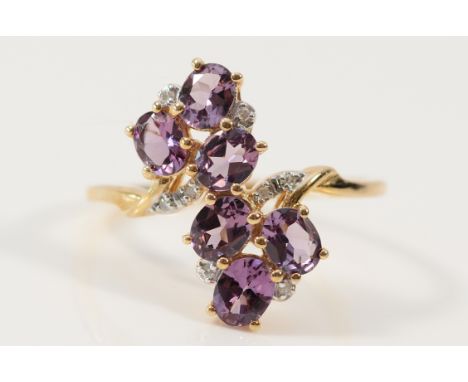 A 9ct gold amethyst and diamond dress ring, R 1/2, 2.8g