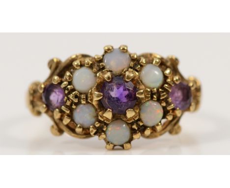 A 9ct gold opal and amethyst dress ring, I, 2g