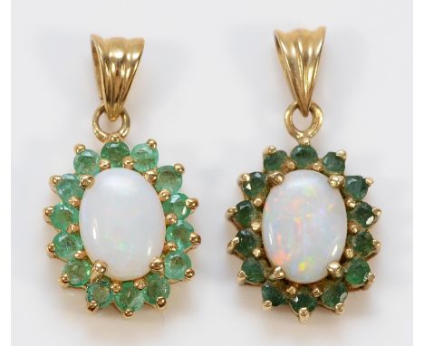 Two 9ct gold opal and emerald cluster pendants, 2.5g