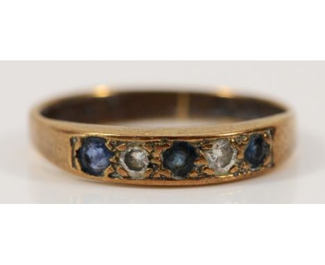 An unmarked 9ct gold sapphire and diamond half eternity ring, hallmarks not present due to resizing, K, 1.6g
