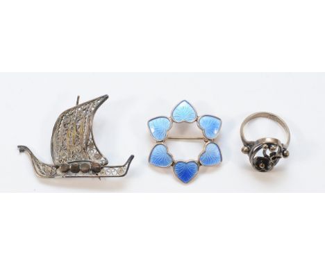 Volmer Bahner, Denmark, a silver and blue enamel heart wreath brooch, 30mm, LB Denmark, a silver longboat brooch, 40mm, and a