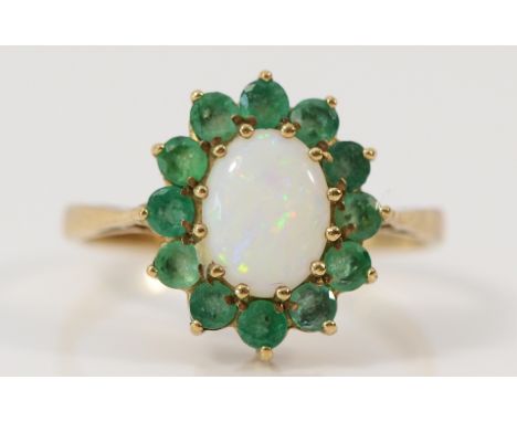 A 9ct gold emerald and opal cluster ring, N, 2.1g Condition-Full UK hallmarks, all stones are secure, no chips or cracks, opa