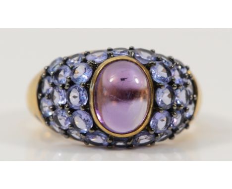A 9ct gold amethyst and tanzanite cluster ring, P, 4.5g