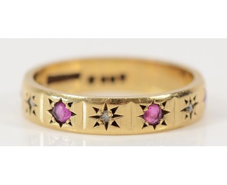 A 9ct gold ruby and diamond half eternity ring, L, 2.5g