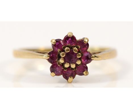 A 9ct gold ruby floral cluster ring, L 1/2, 1.6g