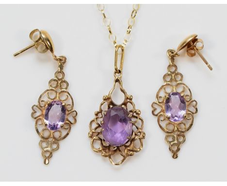 A pair of 9ct gold amethyst drop earrings with scroll backs, together with a matching 9ct gold amethyst pendant on a chain, 3