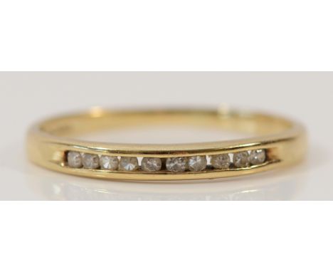 A 9ct gold diamond half eternity ring, K, 1.1g