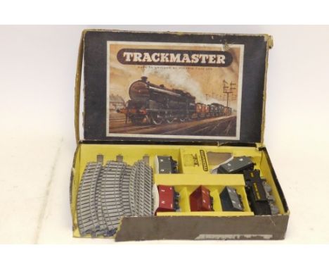 A Trackmaster Pyramid Toys pre-Tri-ang 00 Gauge Train Set, comprising BR black C/W 0-6-2T + key , six trucks and oval of meta