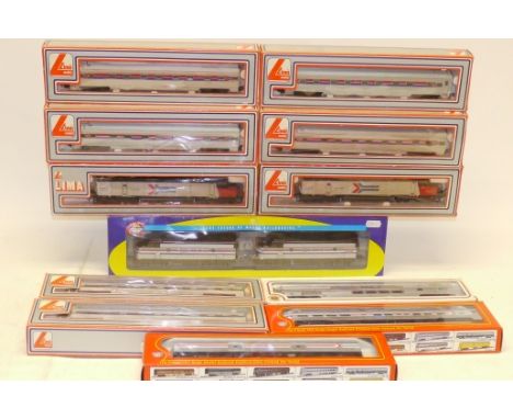 Boxed American HO Gauge Amtrak Locomotives and Coaching Stock by Various Makers, including Athearn F7A locomotive twin-set, p