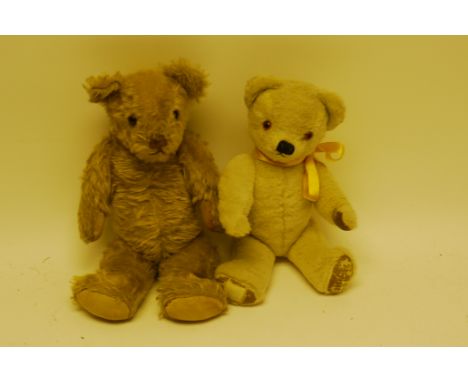 Two British Teddy Bears, A 1930s Invicta with golden mohair, orange and black glass eyes, brown stitched nose and mouth, swiv