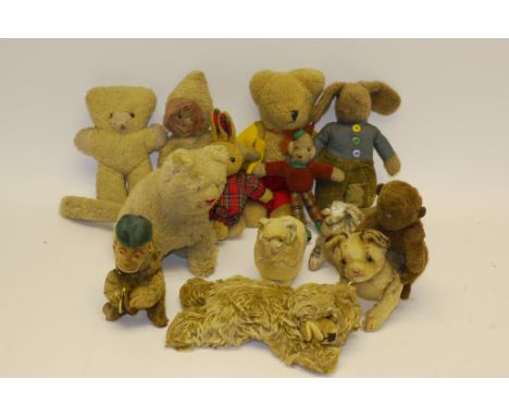 A Collection of Vintage Soft Toys, Including an early Merrythought brown wool plush monkey, a jointed Steiff cat with glass e