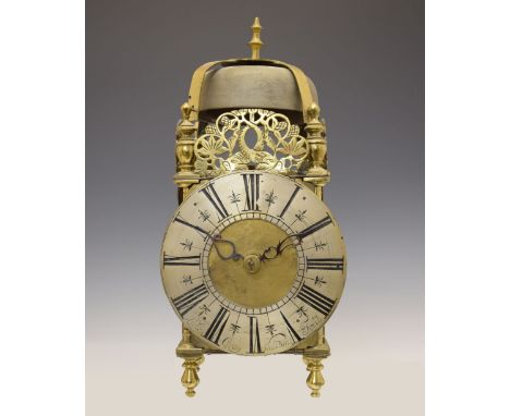 Brass lantern-style clock, the 6.5-inch silvered Roman dial with inner quarter track and half-hour divisions, engraved 'Luke 