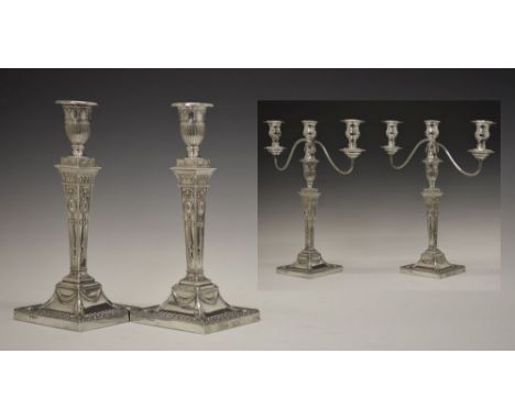 Pair of George VI silver table candlesticks, in the Neo Classical-style with detachable sconces and raised square tapering co