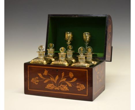 19th Century Dutch marquetry decanter box, the hinged cover with curved front enclosing six gilt-decorated square blown glass