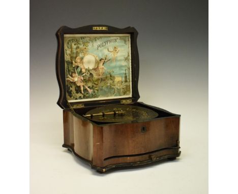 Early 20th Century inlaid walnut-cased Disc Polyphon, the hinged cover with serpentine front and sides, enclosing colour prin