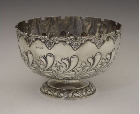 Edward VII silver bowl or Monteith, with shaped rim, floral embossed decoration and circular pedestal base, sponsors mark of 