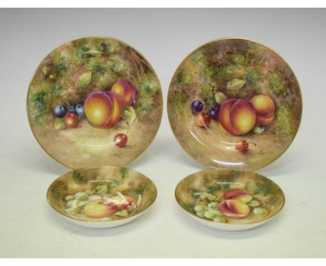 Royal Worcester - Two fruit-painted side plates, each decorated with peaches and cherries, one signed Freeman, the other V.Co
