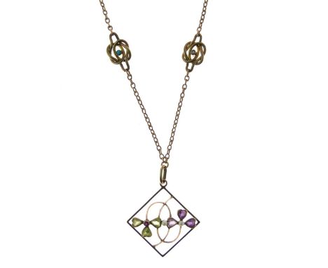 Early 20th Century yellow metal, amethyst and peridot 'Suffragette' pendant, attributed to Liberty &amp; Co, of lozenge desig