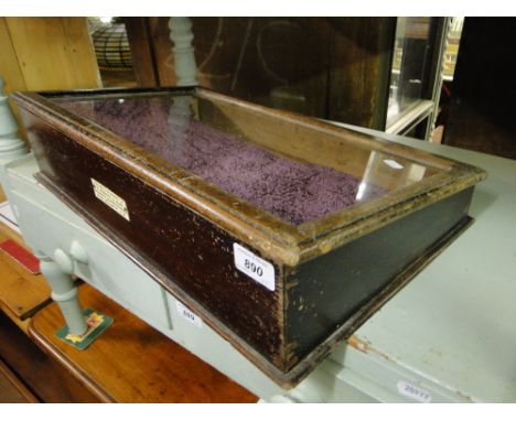 A table top jewellery display cabinet, with label - property of R Roberts & Sons, cigarette manufacturers.