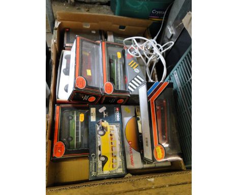 Boxed Collectable model buses including Corgi and Gilbow.