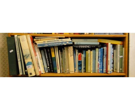 Shelf of books on fishing