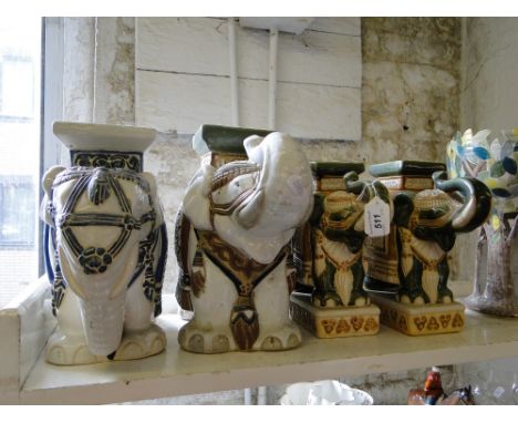 2 Pairs of ceramic elephant plant stands.