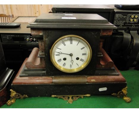 A 2-train slate and marble cased mantel clock.
