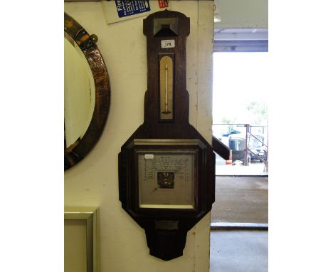 An Oak barometer with plaque dated 1936