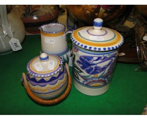 Carter Stabler & Adams Poole Pottery canister and cover, Poole jug and sugar pot, (3).
