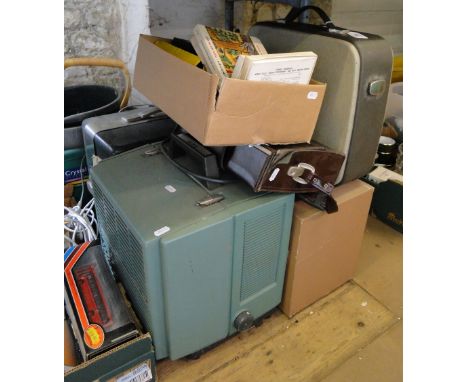 A reel to reel tape recorder, tapes and other sound equipment.