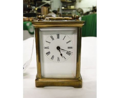 A French brass carriage clock.