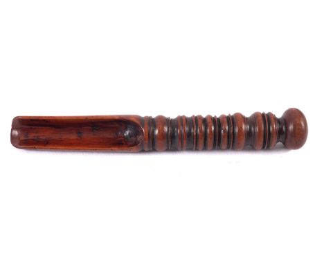 A 17th Century fruitwood apple corer, with ring turned handle and bun top, 14cm long. Provenance:  The Christopher Hawkings C