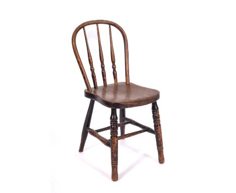 A child's 19th Century elm, ash and beechwood stick back Windsor chair, with ring turned vertical splats to the hoop back, ha