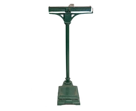 A set of painted cast iron weighing scales, by Avery of Birmingham, early 20th century; with horizontal metal gauge above the