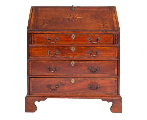 A George II walnut bureau, circa 1740; the fall crossbanded and chequer-strung, inlaid with sunbursts in boxwood and ebony, e