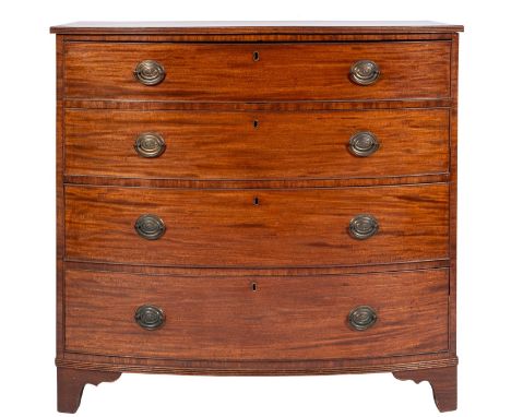 A Regency mahogany bowfront chest of drawers, early 19th century; the top with reeded edges, above four graduated drawers, al