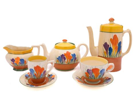 A group of Clarice Cliff Bizarre tea and coffee wares decorated in the 'Crocus' pattern, printed marks, circa 1930-35, compri