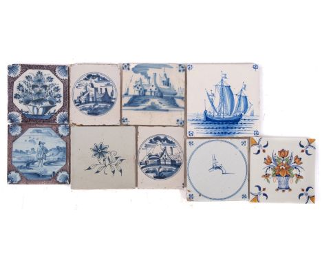 A group of English and Dutch delftware tiles, mid 18th century and later including a blue and manganese tile painted with a m