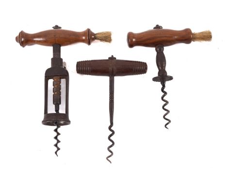 A 19th Century corkscrew, with turned wood handle and brush, a straight pull corkscrew with turned wood handle and brush and 